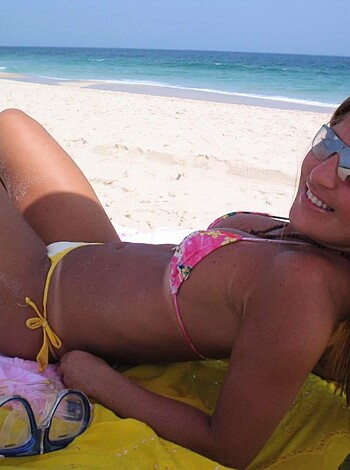 blonde cutie with hot tanlines at beach - Photo 4