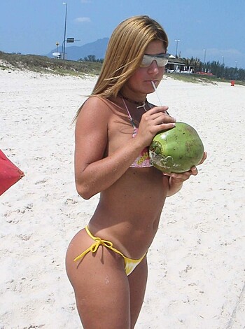 blonde cutie with hot tanlines at beach - Photo 7