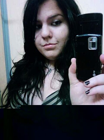 Vulgar, factual description: 
"Tits and ass shot of slutty hoe snapping a fucking dumbass selfie."