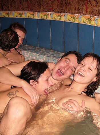 A bunch of fuckin' idiots, soaking wet and shamelessly flashing their stupid tits and asses for the camera like dumb cunts.