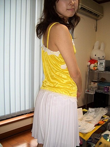 "YOUNG BABE IN A YELLOW BRAS AND PANTIES, WHORE."