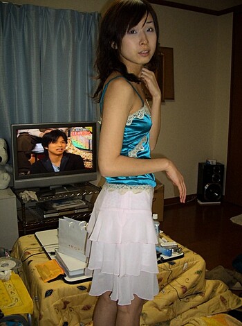 A chick wears a fucking blue frock in this goddamn picture.