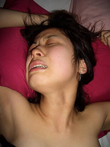 This bitch is fuckin' sleeping naked as hell in her bed with those goddamn eyes closed.