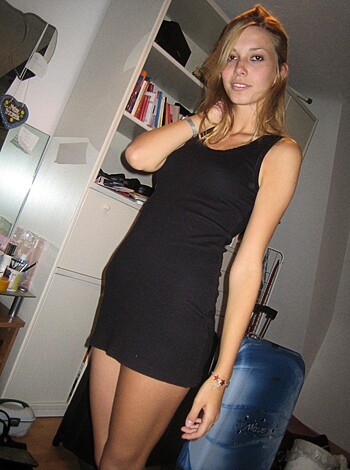 F**k me, this chick's tits and ass are poppin' out of that tight little number she's got on! Better take some f***ing pictures before I explode in my goddamn pants, yo.