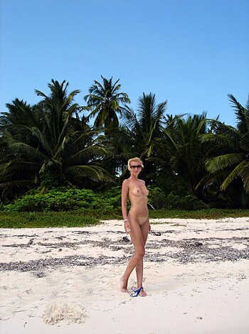 Virgin ass bitch naked on the fucking sandy shore with her fuckable tits and juicy pussy showing through her see-through dress, giving you a great view of her perfect body and milky thighs while she strikes a sexy pose for the camera.
(28 words)