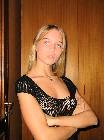 "Here's a pic of some fuckin' bitch standin' all cocky-like, showin' off her shit tits, makin' a dumb face for the camera."
