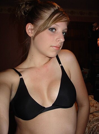 "Here's a picture of some hot chick dressed in black lacy panties, taking a photo."