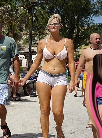 "F**k me raw, son! Check out this bitch in her pink bikini, all sexy as hell! That ass looks so good in those white thongs."