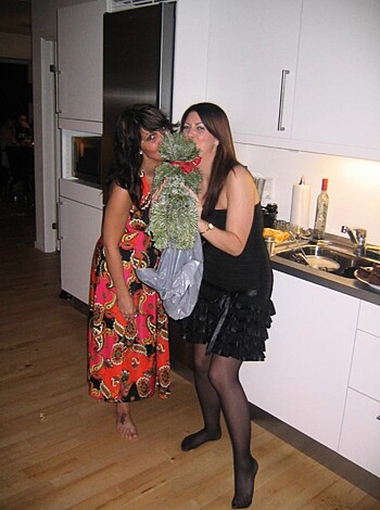 F*ckin' two hoes huggin', one holdin' a motherfuckin' Christmas tree.