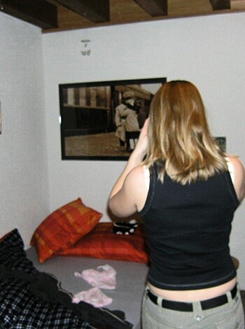 """
Chick snapping a selfie in her fucking mirror.
""