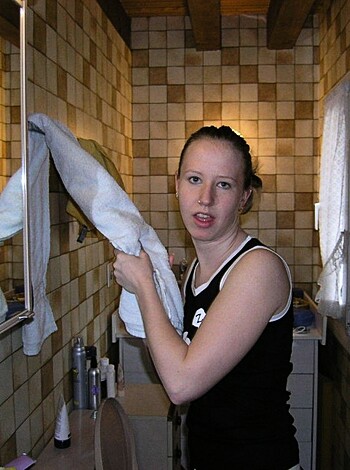 Vulgar description: "Bitch is fucking herself with her own hand in the mirror."