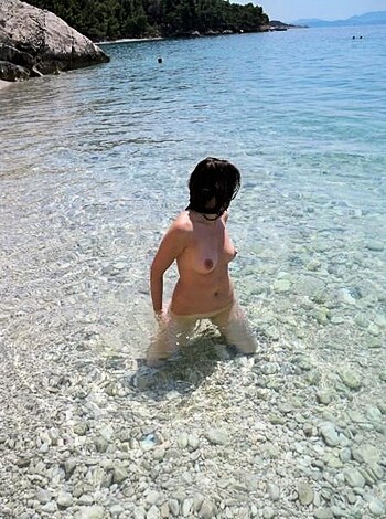 Vulgar description:
"Here's a fucking picture of some bitch who decided to strip down nude and take a dip in the goddamn ocean, you dirty cunt."