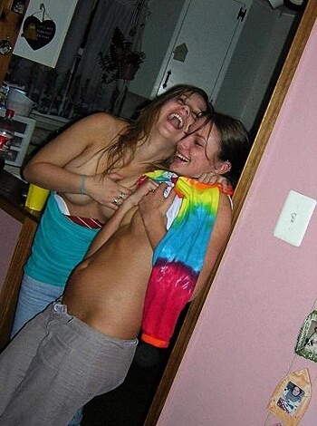 "Three fat sluts with dyke haircuts, wearing faggy rainbow shawls, smiling and snuggling together."