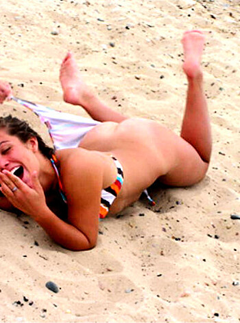 """
This chick is lying ass-naked on the fuckin' beach, laughing her tits off.
"""