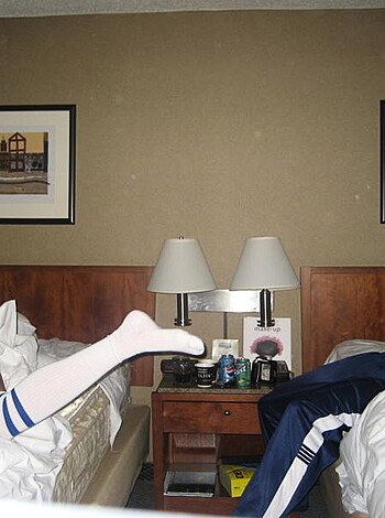 "Watch this hot bitch spread those ass cheeks, as she's kicking off those damn socks for you to see."