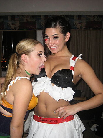 Women on vacation, with bikinis and drinking booze together, have fun and enjoy life.