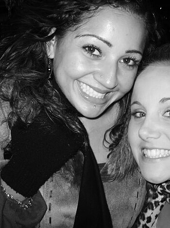 Two horny hoes grinning at each other while they bask in their mutual sexual tension.