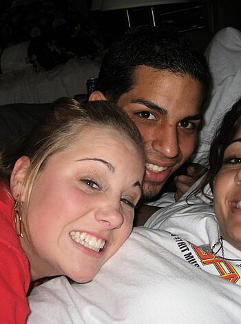 A trio of horny bastards grinning with their dicks out for a selfie.