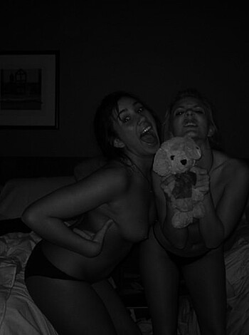 A group of bitches show their tits for the cameras while one gets jewelry on her wrist.