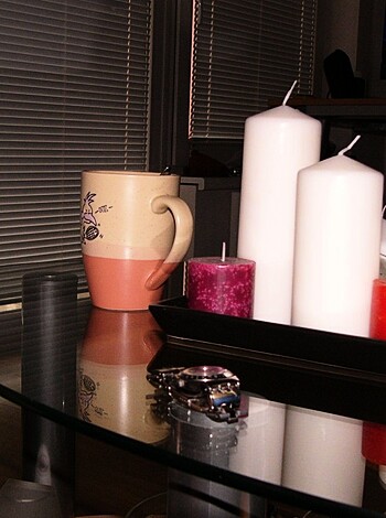 Blood-caked mugs and candles strewn about.