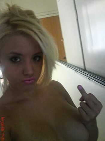 "Fucking hot naked chick shoving her pinky up her tight asshole."