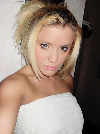 Here's a picture of a hot chick in a bath towel, her tits and ass hanging out like a fuckin' wet dream.