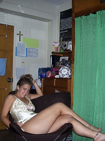 "Check out this hot chick in her skimpy panties, straddling that fucking bed."