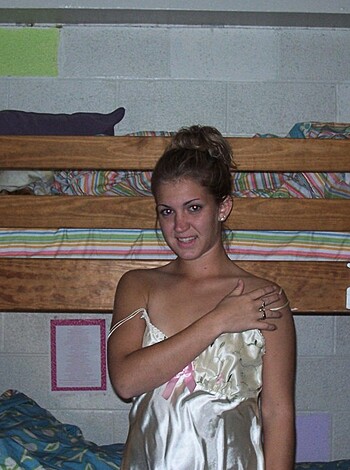 """
The babe in satin sheets fucking on her college crib.
"""