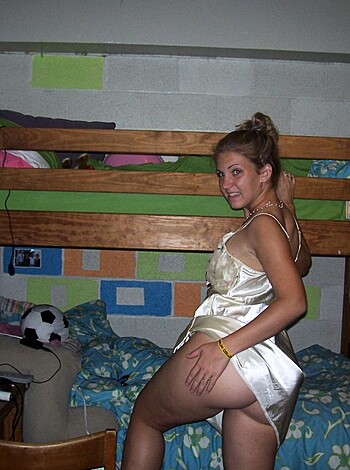 "Look at this fat assed bitch, showing off her ass crack in a flimsy thong. What a fucking skank."