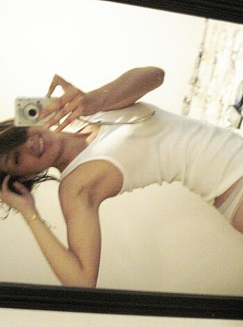 She took a fucking selfie, ass up in the air, showing off her tits and pussy.
