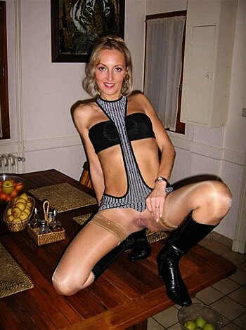 "F***ing hell, b*tch! Look at those f******g sexy thigh-highs and silky ass stockings. Damn, I wanna tap that pussy."