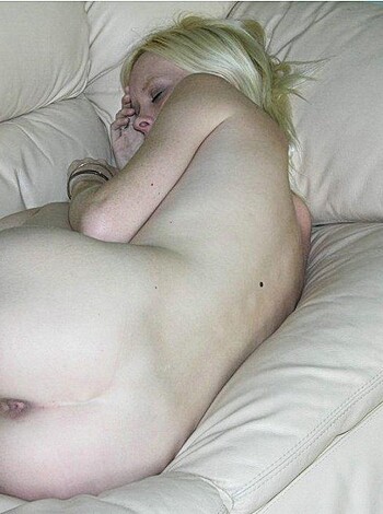 """
Here's a picture of a fucking hot babe with her tits and ass out, chillin' on a couch.
 """