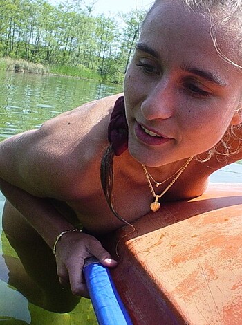 "Damn sexy bitch sprawled out naked on her fucking paddleboard."