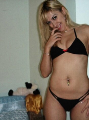 """
Fuckin' hot chick in some fuckin' tight bikini, showin' off her tits and ass like a damn porno model. Smile on her dumb-ass face. 
"""