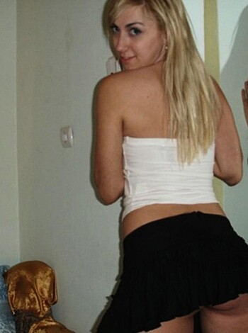 "This fucking image shows some hot blonde bitch with her tits out and ass crack on display, brah."