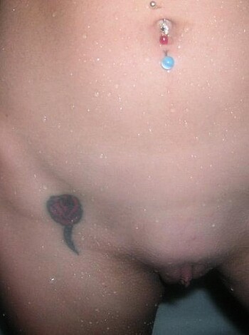 "Fuckin' hot slut with muscles, ink, and metal bits shit-faced drunk in her own shiny bling."