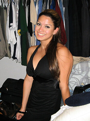 Vulgar description: "Cum-guzzling bitch sucking dick in a tight-ass little dress, with a dumb-ass smile on her face."