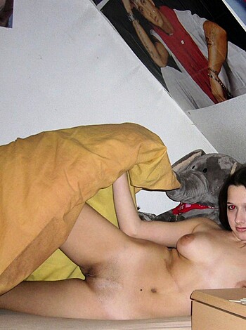 "Fucking hot chick taking off her fucking shirt while lying on that motherfucking bed, am I right?"