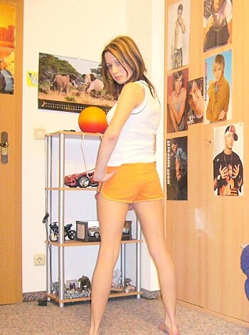 "Yo, check out this hot bitch in her tight-ass orange shorts! Damn!"