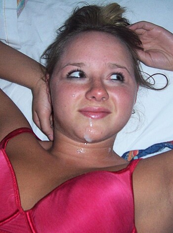 Fuckin' hot bitch on her back with red brassiere covering her tits and hand on her pussy while lying down, get a load of that tight ass hole open for your cock to slip in deep.