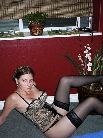 A nude babe sportin' sexy lingerie, all blacked out.