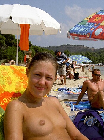 "Fuckin' bitch lying on the sand with her tits out."