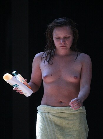 Vulgar description: "A f*cking nude b*tch stands with a towel draped over her tits, holding some goddamn soap."
