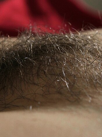 A fucking close up of some dude's hairy nuts.