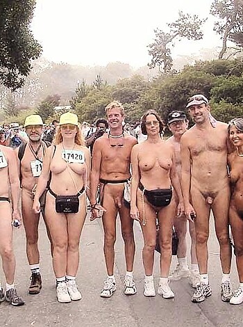 Picture shows a bunch of bare ass fuckers dressed solely in footwear and shades striking a pose for a pic at some damn running competition.