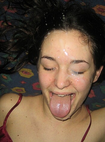 """
Look at this fucking hot bitch lying on that bed with her mouth open and tongue sticking out, like she's trying to suck some dick or something. Fuck me running, look at those titties. If you ask me, she's not even wearing a bra under that shirt. And if you think about it, why the fuck would anyone ever wear a bra in bed? It's like the most uncomfortable thing you can put on, right?
"""