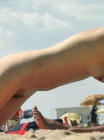 "Here's the fucking picture of a nude bitch doing a handstand over some poor guy lying on the beach, like wtf bro?"