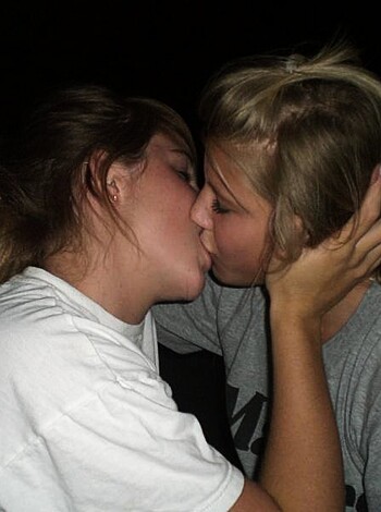 A couple of chicks making out in the dark with their tongues down each other’s throats, all up in each other's business like whoa.
