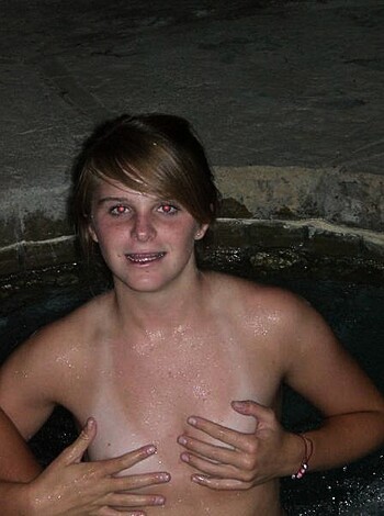 """
Here's a picture of two nude chicks and their toy boy in a bubbly spa bathtub, all getting fucking drunk.
 """
