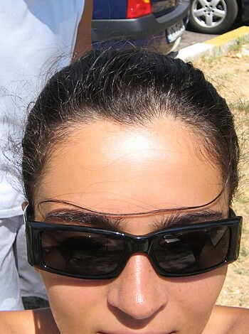 F*cking bitch looking hot af on the f*cking beach with her f*cking shades.
